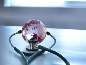 A globe and a stethoscope