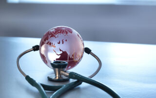 A globe and a stethoscope