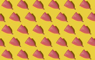 Pattern of rows of pink menstrual cups