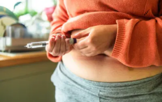 person administering weight loss drugs